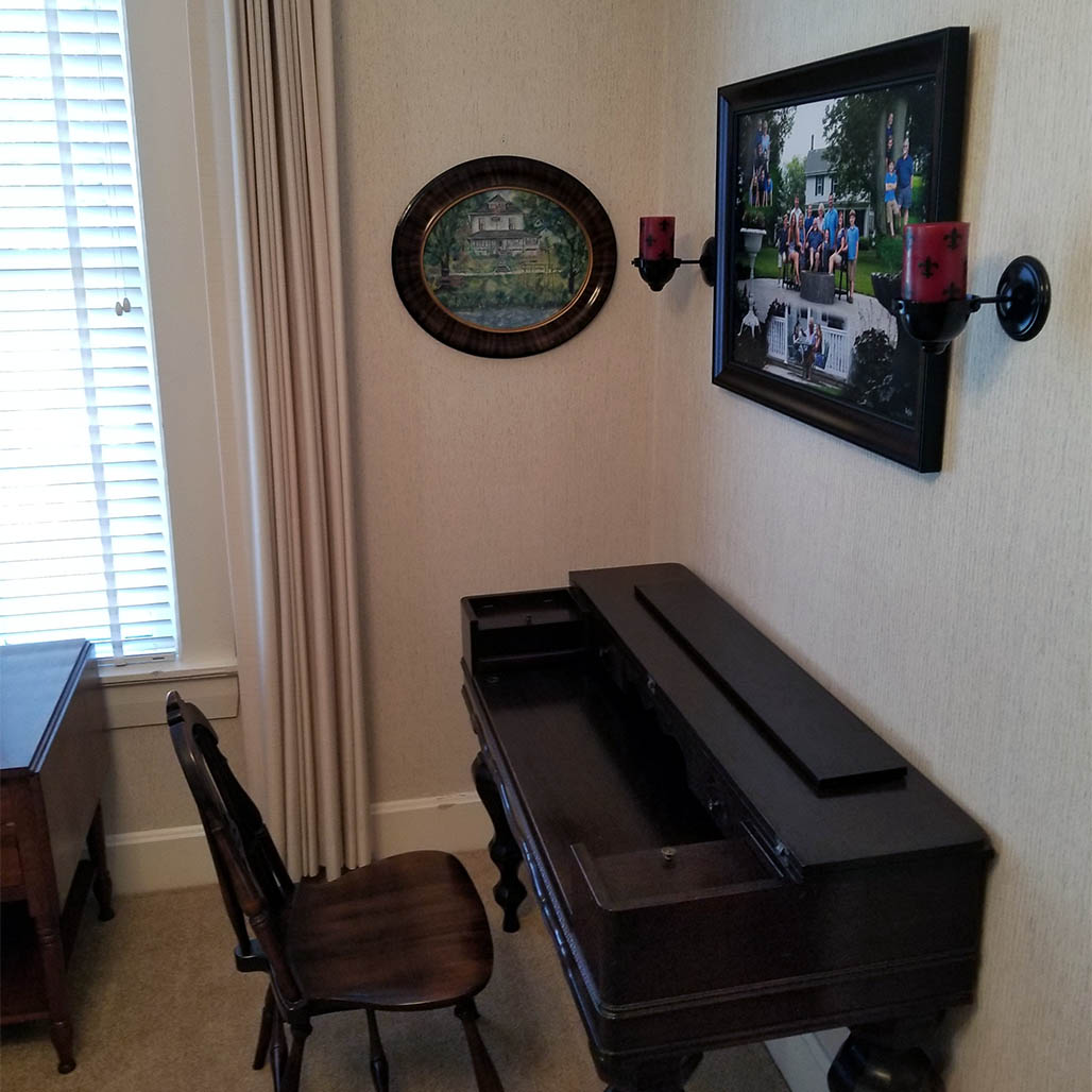 Antique writing desk moved by Speeding Movers in Moline IL